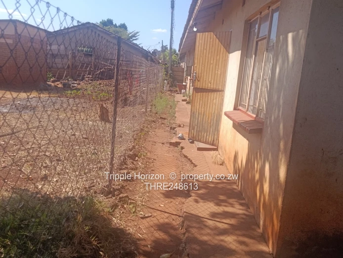 Kuwadzana phase 3, 4-Bed, 2-Bath House on Quiet Dirt Street — Borehole