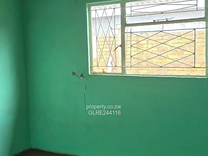 Tiled 2-Bed Kuwadzana Home — Borehole & Parking