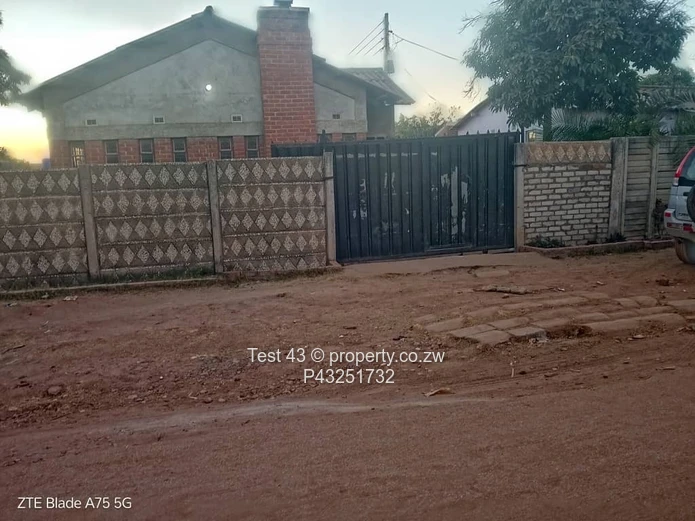 4-Bed Zengeza House — Walled, Gated with Brick Chimney