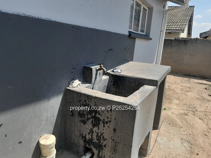 A four bedroomed house for sale in Mainway Meadows, Waterfalls in Harares