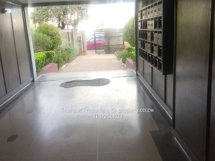Avenues 2-Bed Flat: Tiled Lobby & Gated Entry