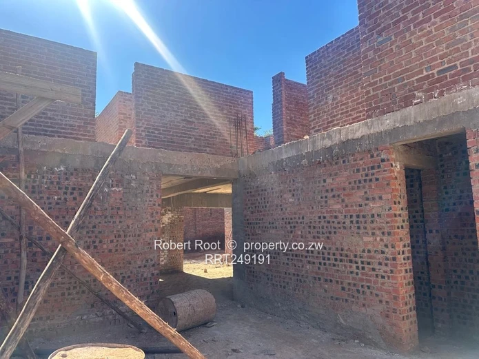 Luxury Awaits in Borrowdale: Finish Your Dream Home Today!