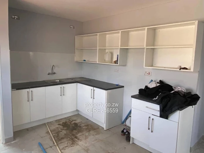 For Sale 4-Bed 2 Apartments Townhouse Complex in Budiriro Cabs  - Walled, Paved, Fitted Kitchens