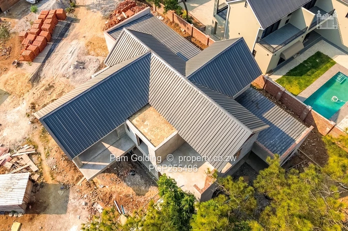 4 Bed Incomplete Cluster Off Harare Drive (Sole Mandate)