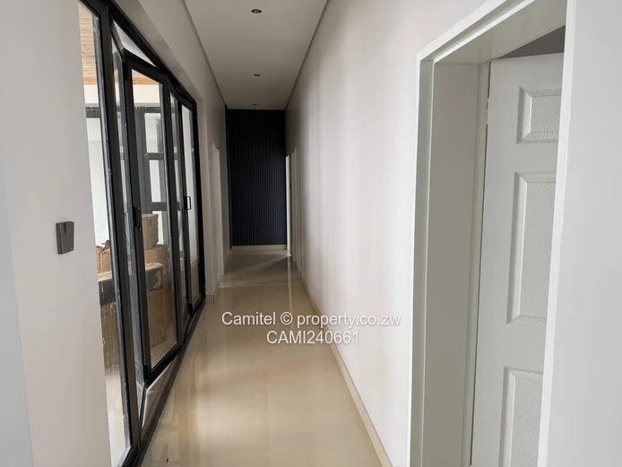 4beds all en-suite ,borehole,swimming pool sitting on 540sqm and title deed