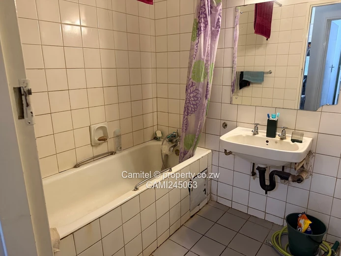 Chinamano Heights:Parquet-Floored 2-Bed Avenues Flat with Borehole (Sole Mandate)