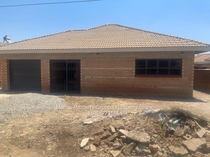 Madokero 4-Bed Brick Home with Garage & En Suite