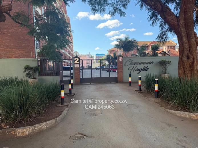 Chinamano Heights:Parquet-Floored 2-Bed Avenues Flat with Borehole (Sole Mandate)
