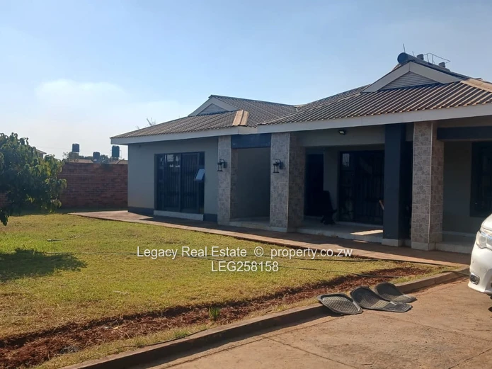 Spacious 4-Bed Home with Island Kitchen & Borehole