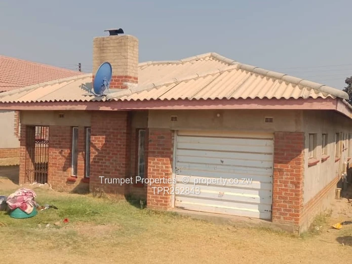Spacious 4-Bed Brick Home with Verandah & Garage