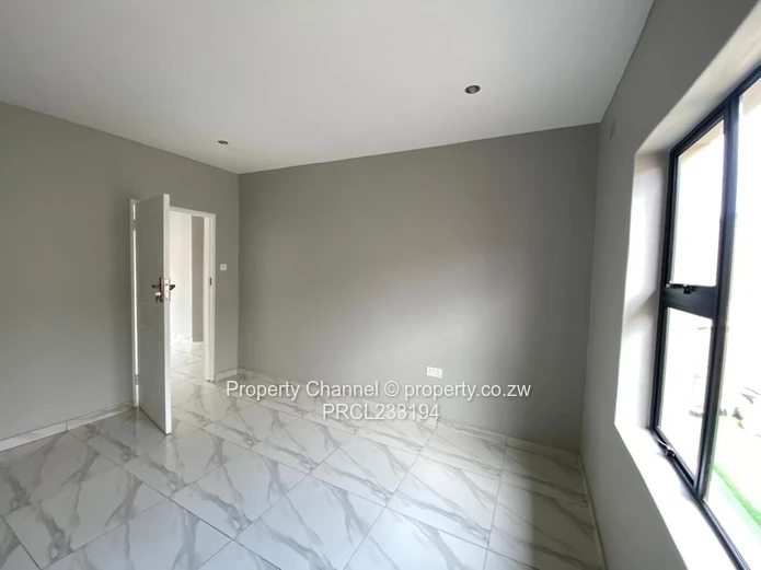 Modern 1-Bed Flat in Pomona, Harare North — Borehole