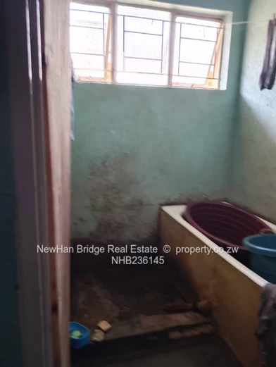 Norton 4-Bed Home with Gated Yard & Mango Trees