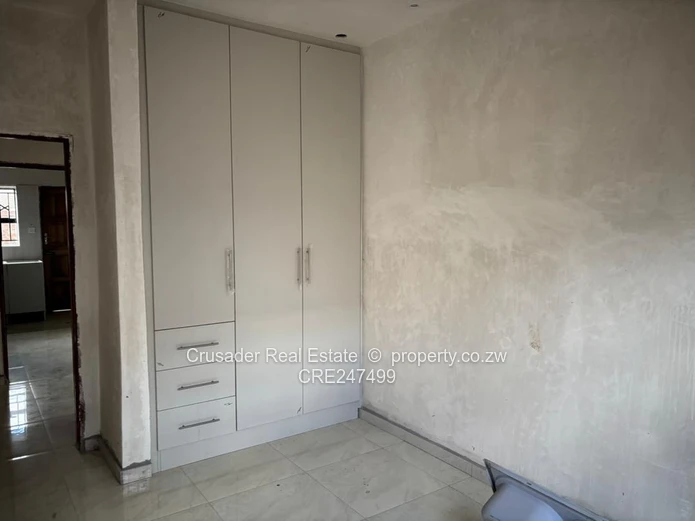 Modern 2-Bed Flat in Tynwald — Borehole & Built-ins (Sole Mandate)