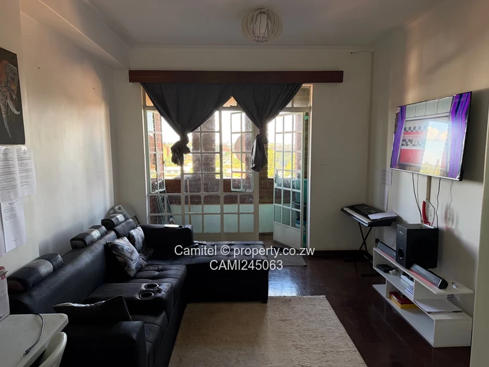 Chinamano Heights:Parquet-Floored 2-Bed Avenues Flat with Borehole (Sole Mandate)