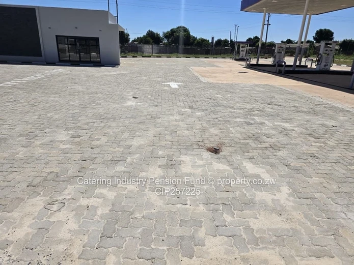 Mkoba Retail — Glass Front, Paved Forecourt & Borehole