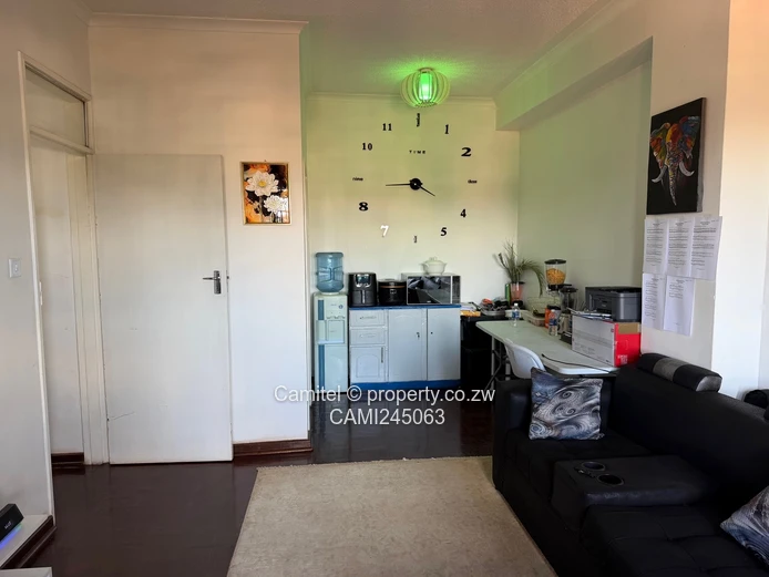 Chinamano Heights:Parquet-Floored 2-Bed Avenues Flat with Borehole (Sole Mandate)