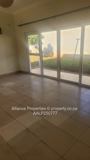 Spacious 2-Bed Ground Floor Flat with Borehole & Garden