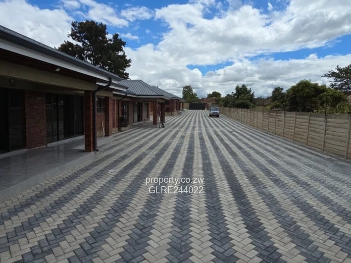 Paved Red-Brick 2-Bed Home with Borehole in Mabelreign