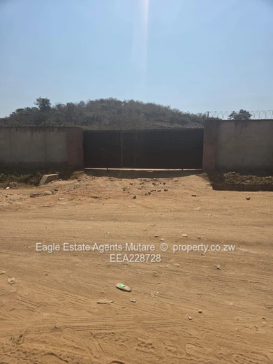 Industrial Stand Close To Railway Line And Road.