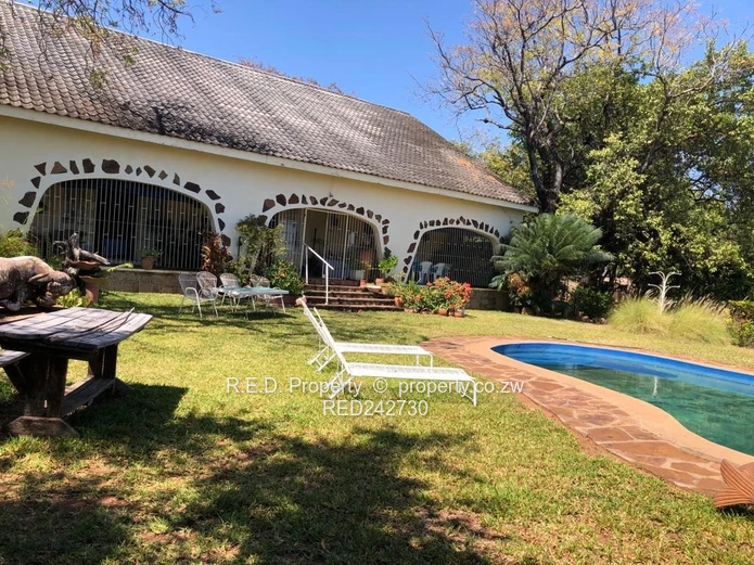 A Brick Under Tile Home In Binga