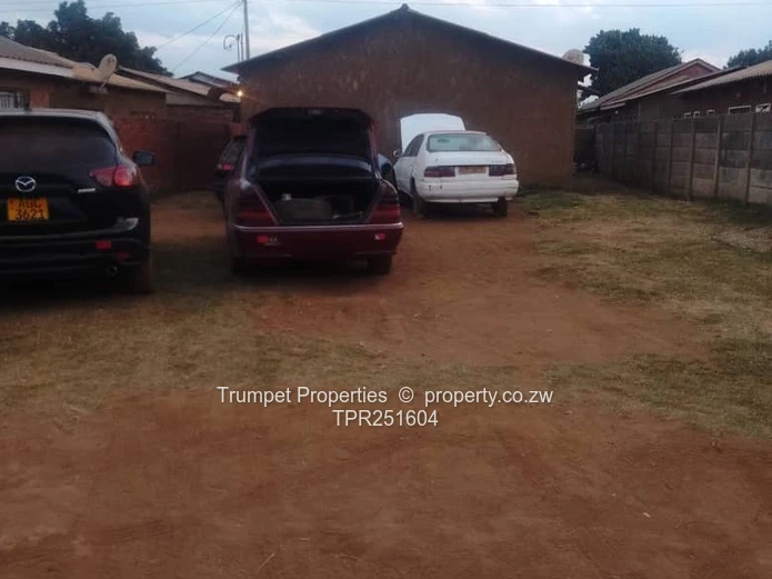 2-Bed Dzivarasekwa Ext— Walled 3 sides Yard, Parking, Sewer, Good ZESA