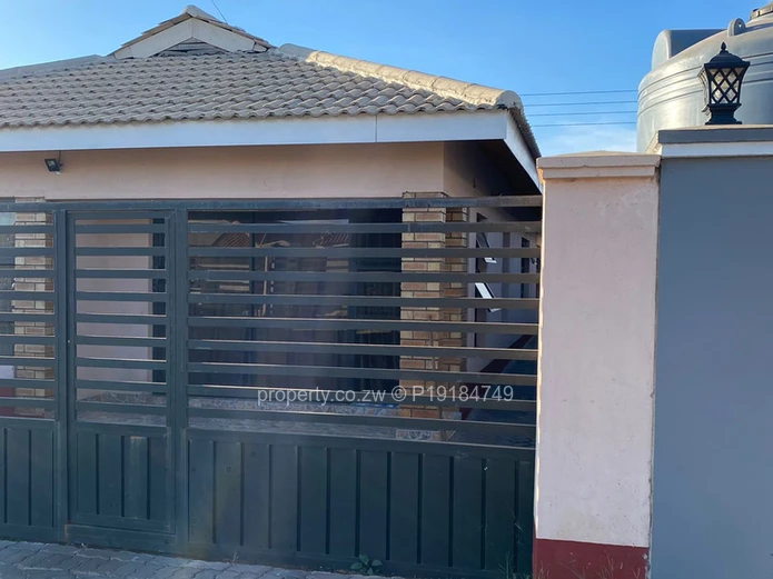3-Bed Walled Home, Tiled Roof & Secure Gate — Aspindale