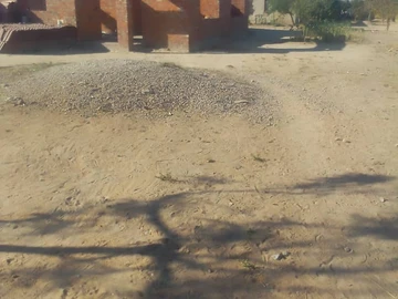 Stand with an incomplete cottage for sale