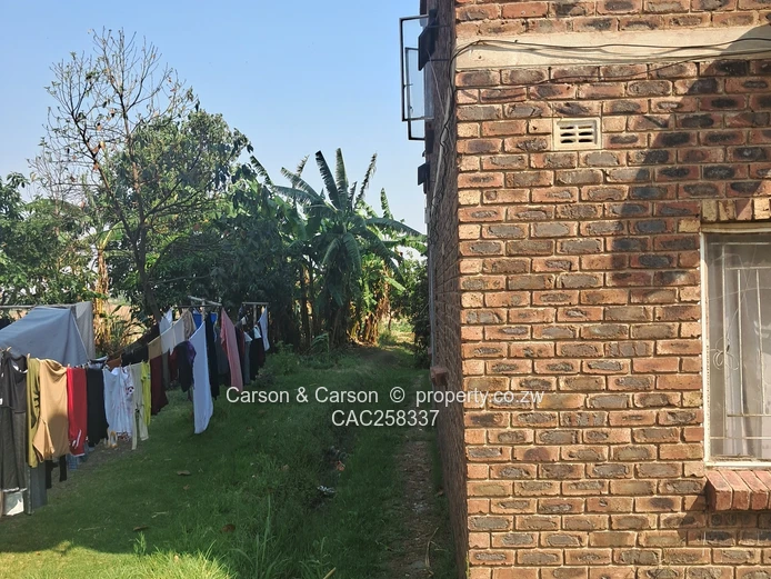 Mufakose 2 bedroom flat lounge fitted kitchen combined toilet and bathroom on ground floor 