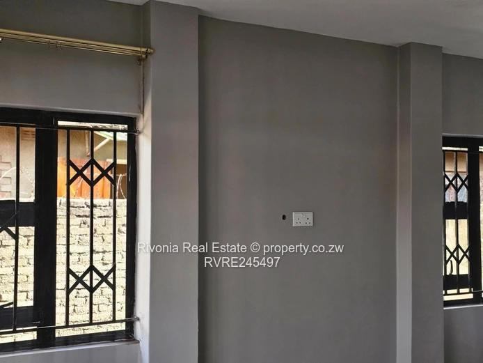 Budiriro 2BR/2BA  — Fresh Grey Interior & Secure main  Grills with 2 wings  