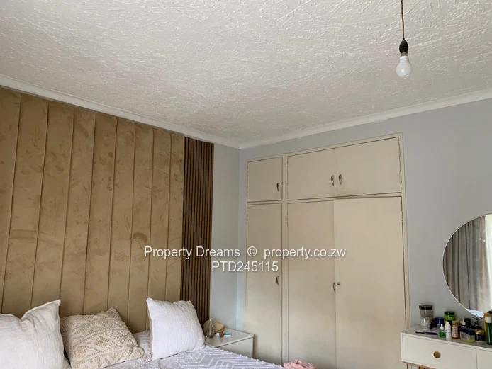 Harare CBD 2-Bed Garden Flat — Updated Kitchen & Borehole