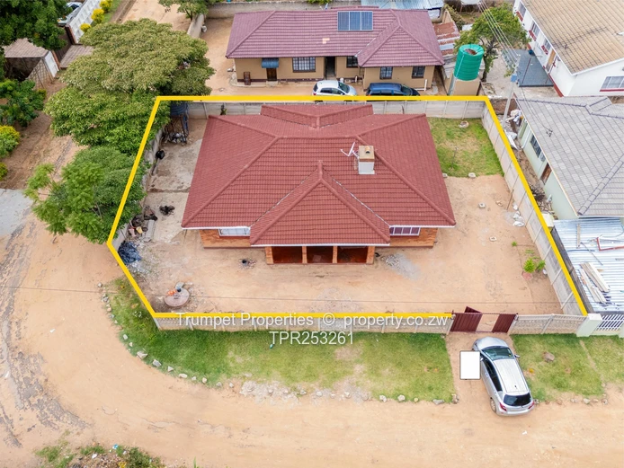 Red-Tiled 4-Bed Home in Zimre Park — Walled Verandah