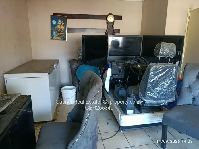 Prime Masvingo CBD Office/flat currently being used as a Driving school, Car wash and restaurant.