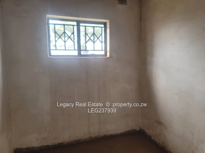 Prime Residential Plot with 4-Bedroom House to Complete