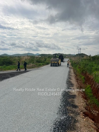 1250m² Bindura Stand — Tar Road, Water Tanks & Views