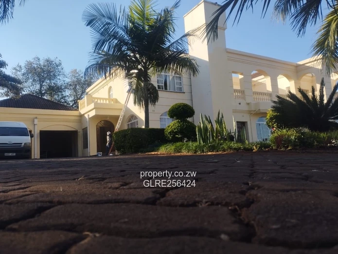 Palm-lined Borrowdale 5-Bed Home, 1,200m² & Borehole