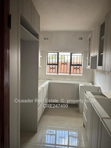 Modern 2-Bed Flat in Tynwald — Borehole & Built-ins (Sole Mandate)