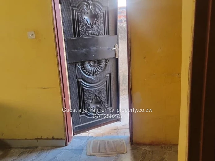 A neat 7-roomed, 4-bedroom house sitting on 200m², ideal for a family or as an investment property.