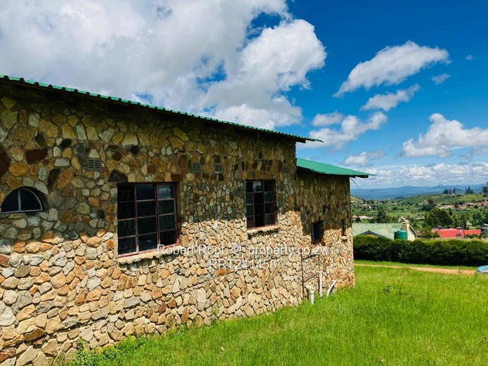 Stone Lodge for Sale in Nyanga — 1,800 m² with Mountain Views