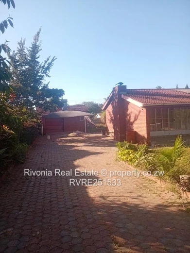 3-Bed Brick Home with Fireplace, Veranda & Garden in Westgate