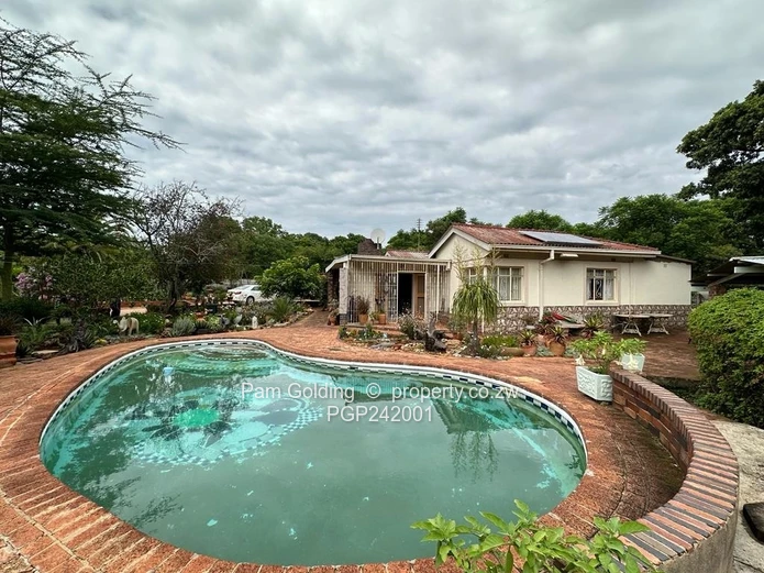 Charming, Compact Residence Set On Spacious Land