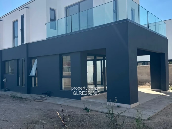 Contemporary 4-Bed Borrowdale Apt — Balcony & Borehole