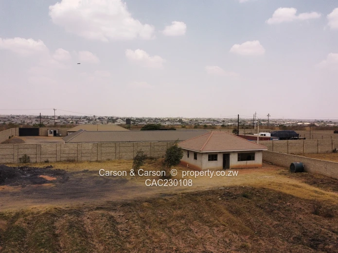 Walled 2568m² Stand on Gravel Road — Chitungwiza (Sole Mandate)