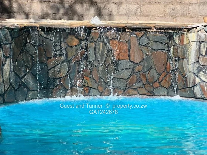 Ten bedroomed lodge under thatch for sale 