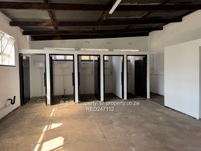 Large-Scale Commercial Property with Extensive Warehouse and Business Space In Belmont!