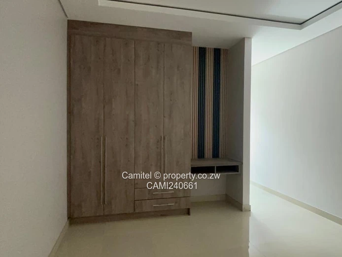 4beds all en-suite ,borehole,swimming pool sitting on 540sqm and title deed