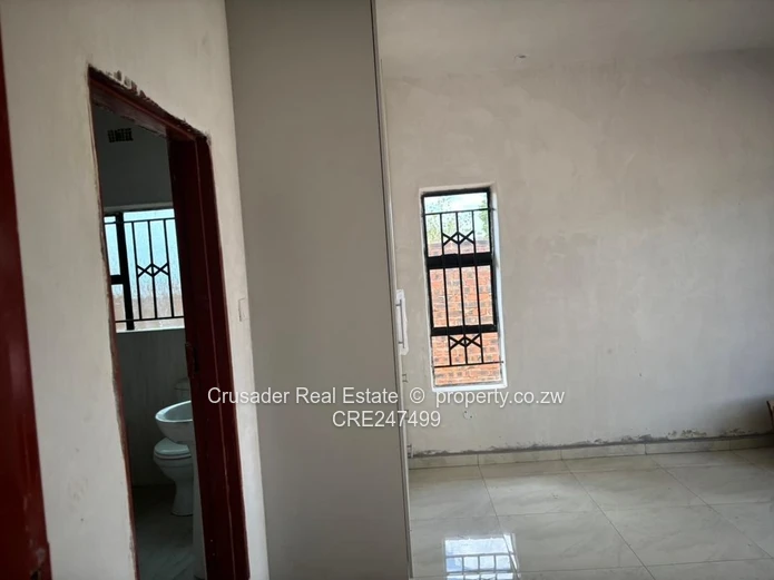 Modern 2-Bed Flat in Tynwald — Borehole & Built-ins (Sole Mandate)