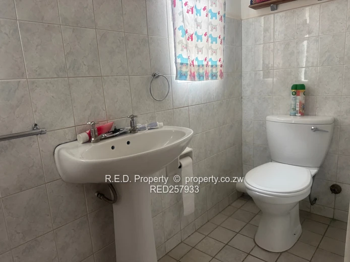 A Charming Home in a Secure Community