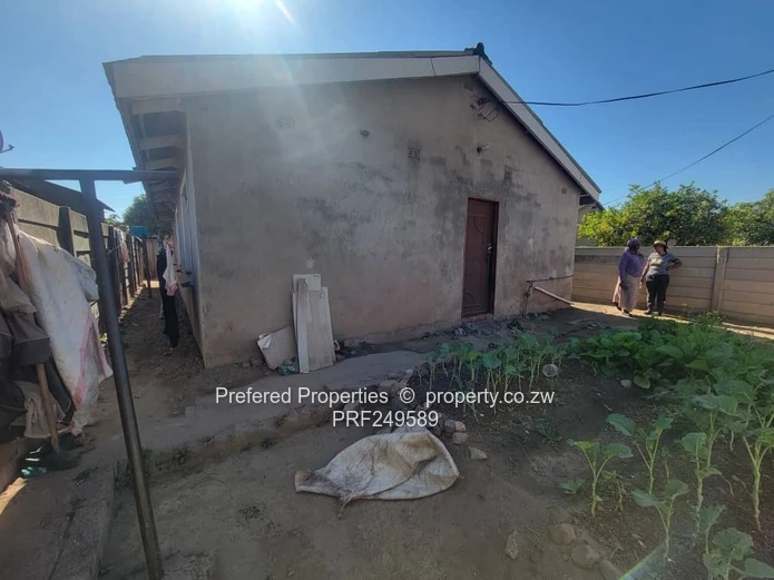 Walled 3-Bed Brick Home with Verandah in Kuwadzana