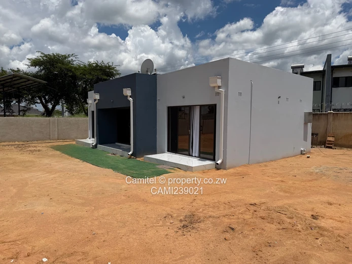 2100sqm Arlington stand with modern 2 bed cottage,gated community with clean title deed (Sole Mandate)