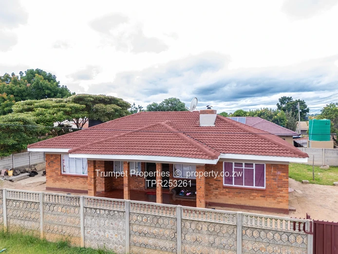 Red-Tiled 4-Bed Home in Zimre Park — Walled Verandah